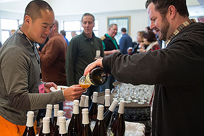 Patrick Pouring Beer for Tristan Chan